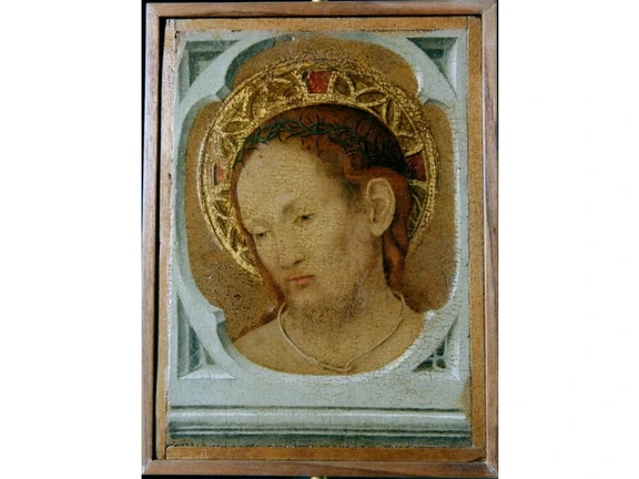 De andere kant van het paneel laat een volwassen Jezus zien