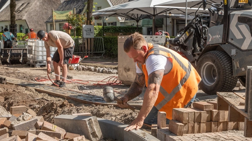 Foto: In beeld: genieten, ploeteren en verkoeling zoeken op deze tropische dag