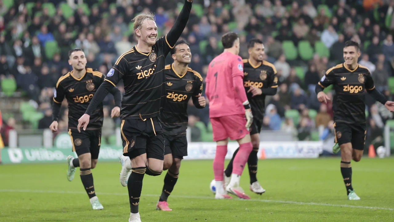Ajax beats FC Groningen 5-2 to stay close to Eredivisie leaders