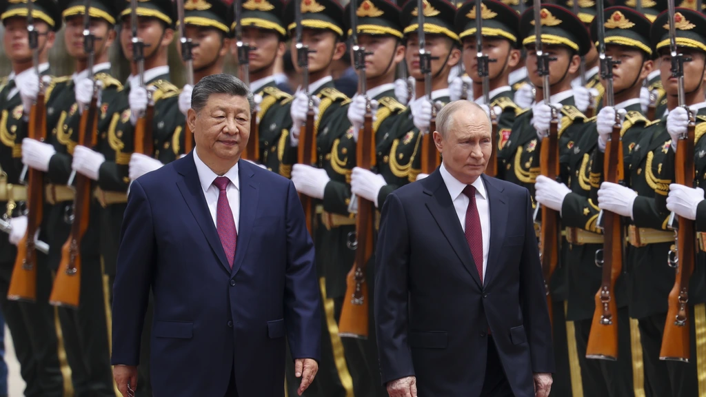 Foto: Xi en Poetin benadrukken strategische samenwerking in Peking, kort na bezoek Trump