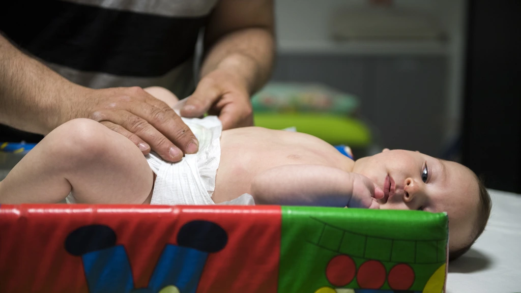 Foto: Kamer: geef kind niet meer automatisch achternaam vader bij onenigheid
