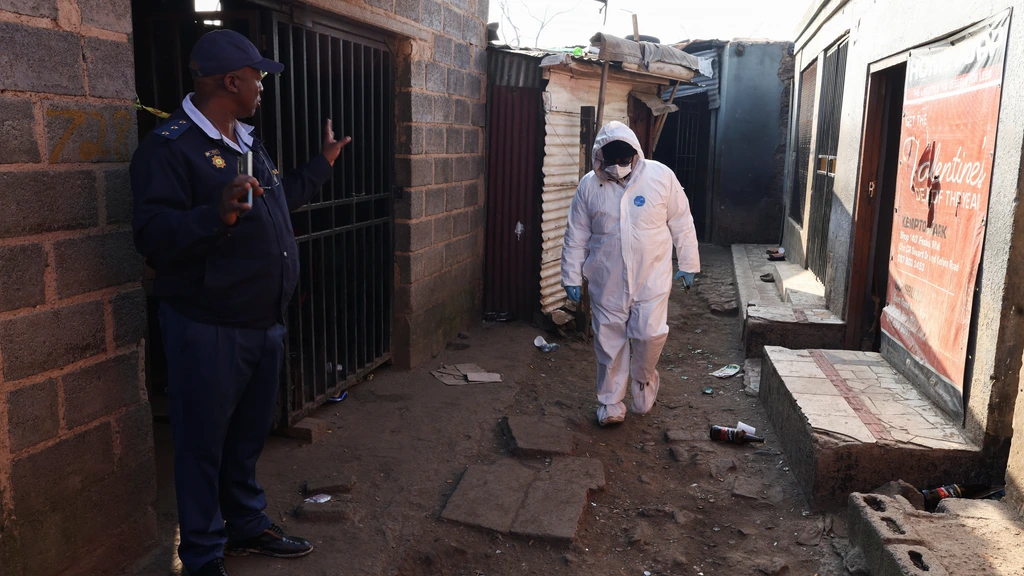 Foto: 12 doden bij schietpartij in Johannesburg, klopjacht op schutters
