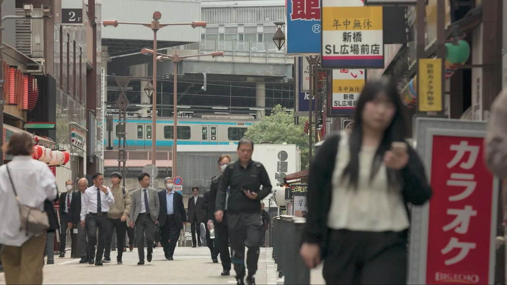 Japan wil werknemers uit hun pak nu zomers steeds heter worden